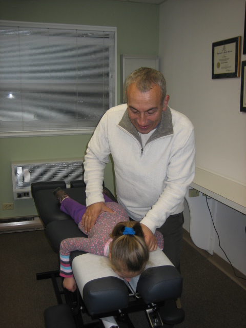 Dr. Gregor with one of his younger patients