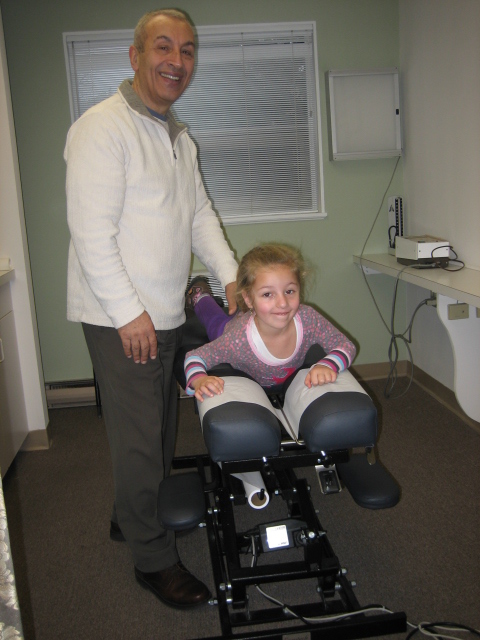 Dr. Gregor with one of his younger patients